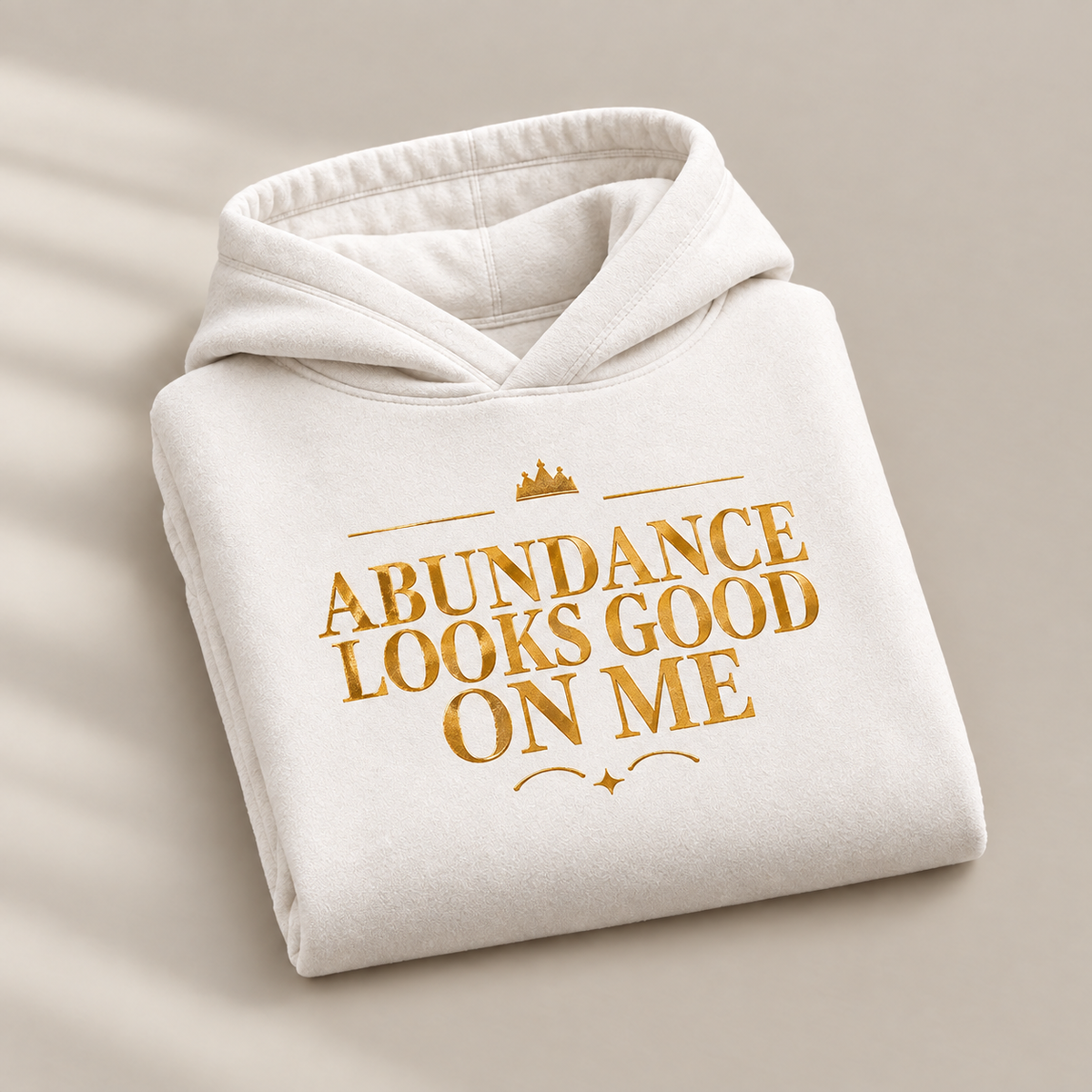 Abundance Looks Good on Me affirmation hoodie – folded view