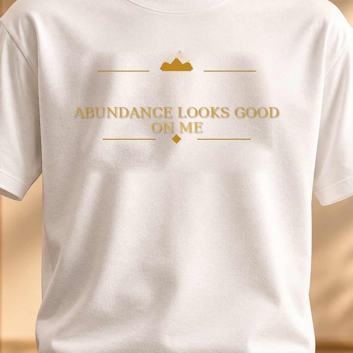 ABUNDANCE LOOKS GOOD ON ME tee — premium luxury design detail