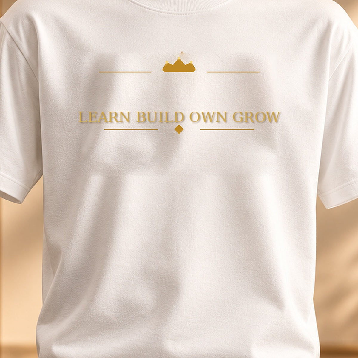 LEARN BUILD OWN GROW tee — premium luxury design detail